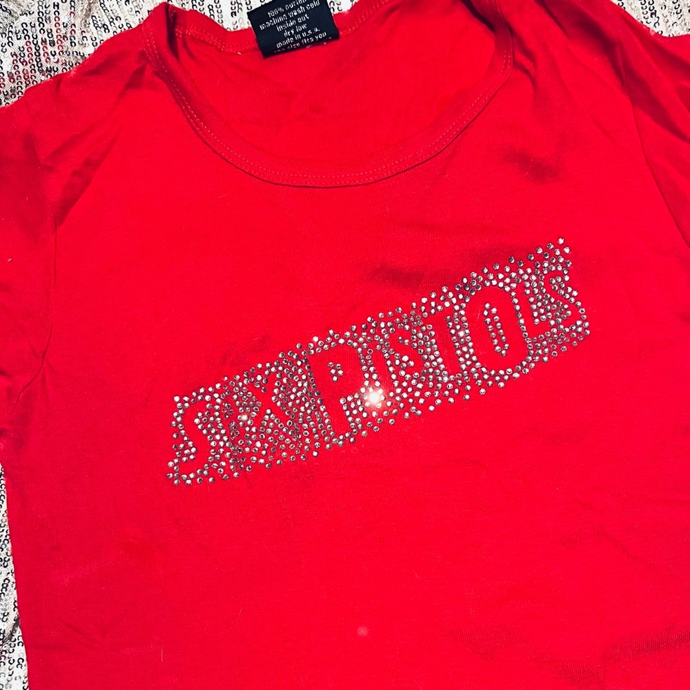 Vintage Sex Pistols rhinestone baby t-shirt.
Very rare.